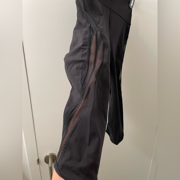 Lululemon 25 inch black leggings with sheer striped sides - Picture 2 of 9